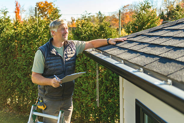 Professional Roofing technician working in Kellerton, IA